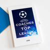 notebook with football motif and the words 'when it comes to coaches, you're top of the league' can be customised with a name