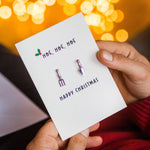 christmas card with cufflinks attached