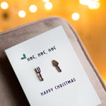 christmas card with gardening pun and gardening themed cufflinks attached