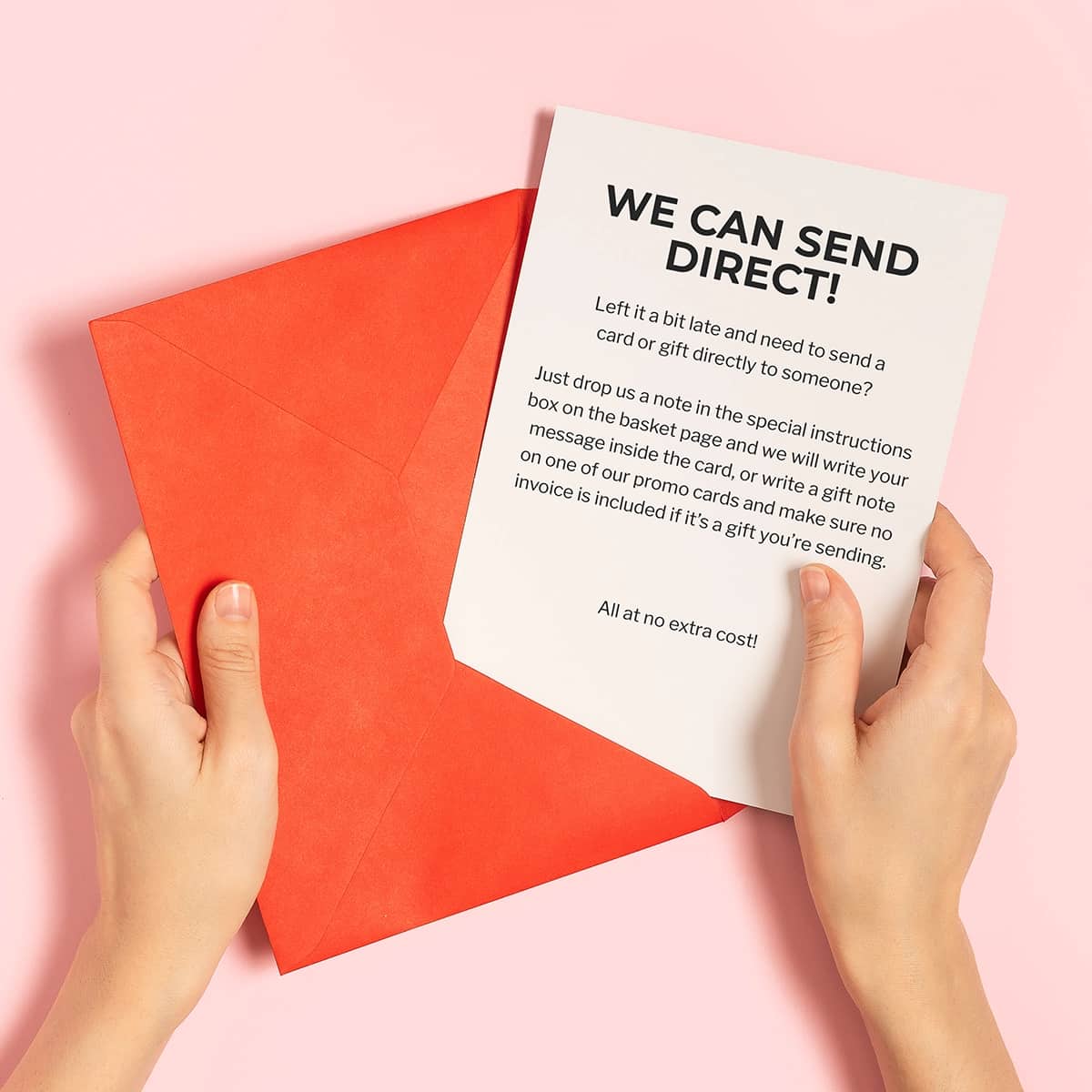 a hand putting a card in an envelope detailing how of life and lemons can send cards and gifts directly to recipient