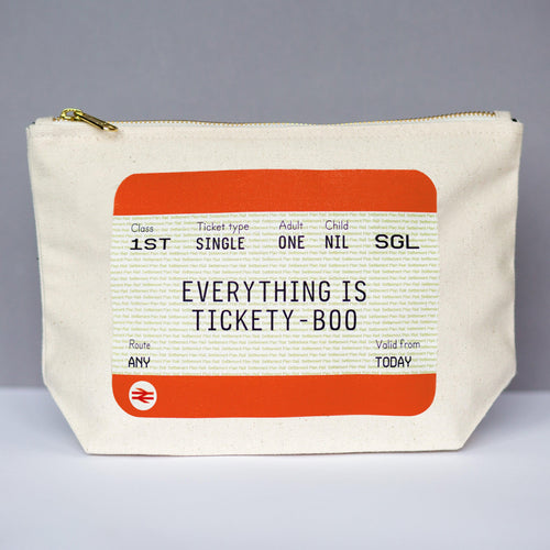 Cosmetic bag designed to look like a train ticket with funny quote