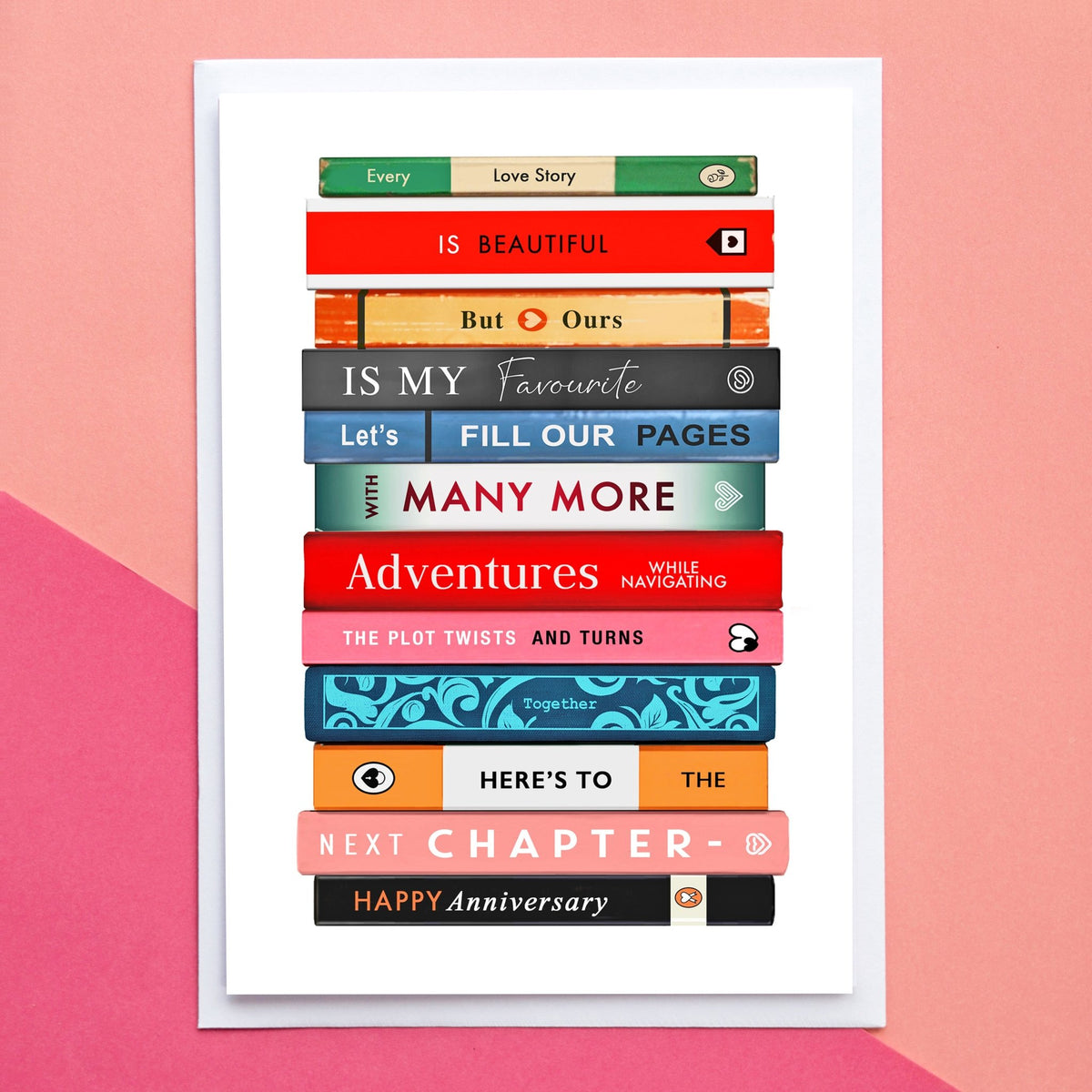 Anniversary card that features a stack of books with text on a pink background