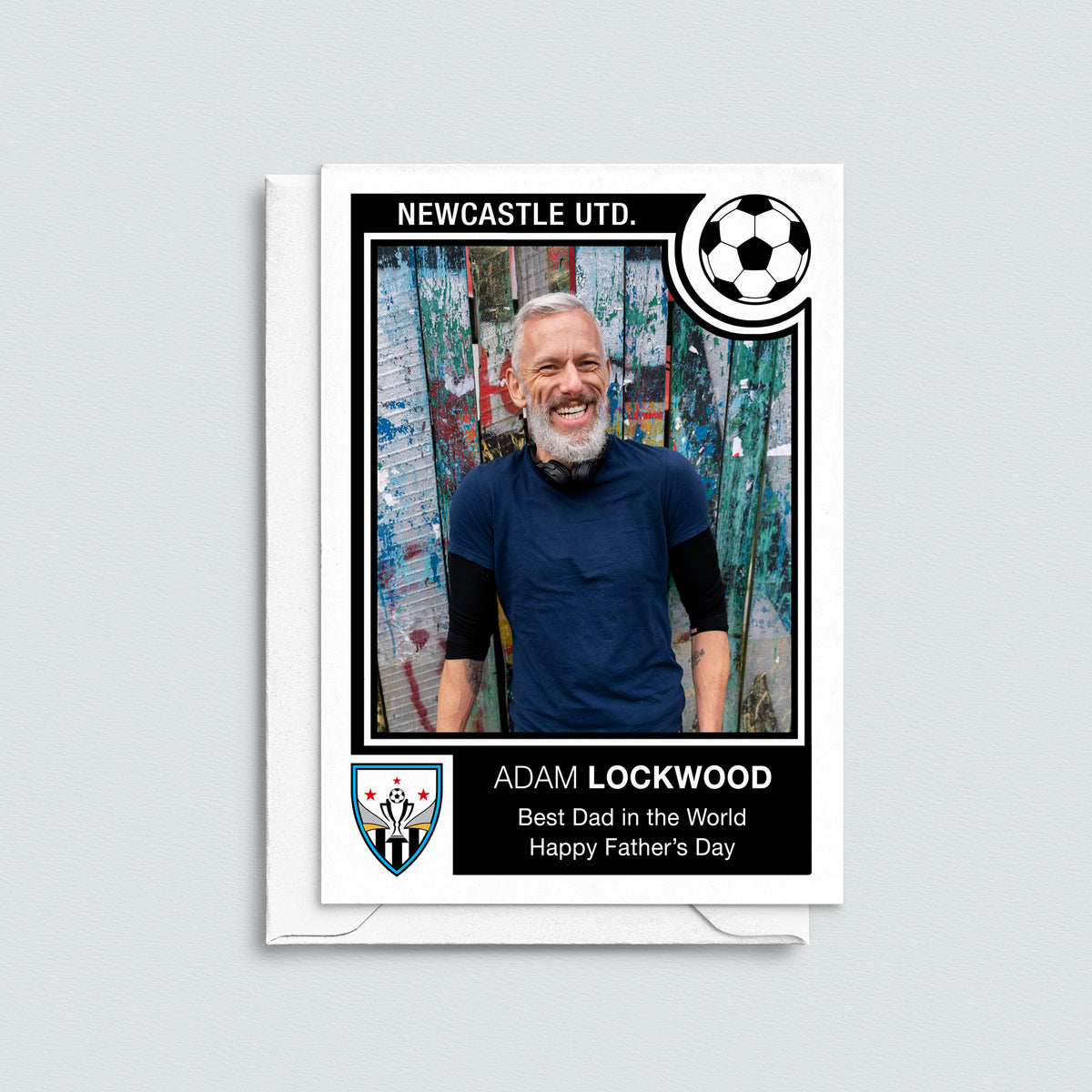 Father's Day card with a personalized design featuring a man, Newcastle Utd. branding, and a soccer ball icon.