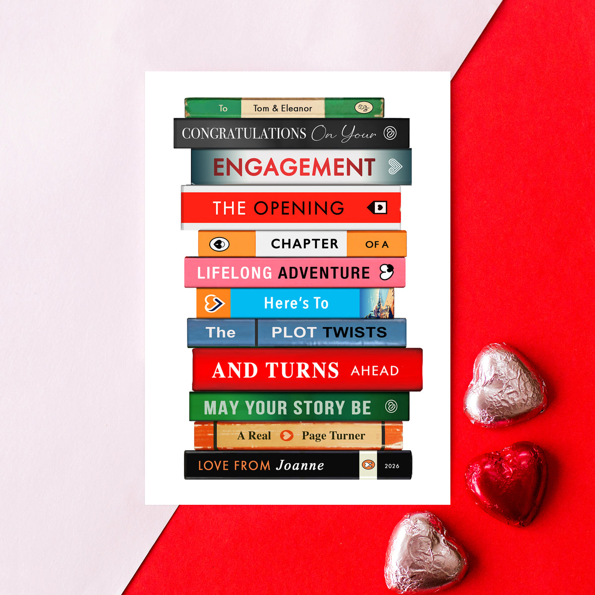Engagement card with book stack design on a red background