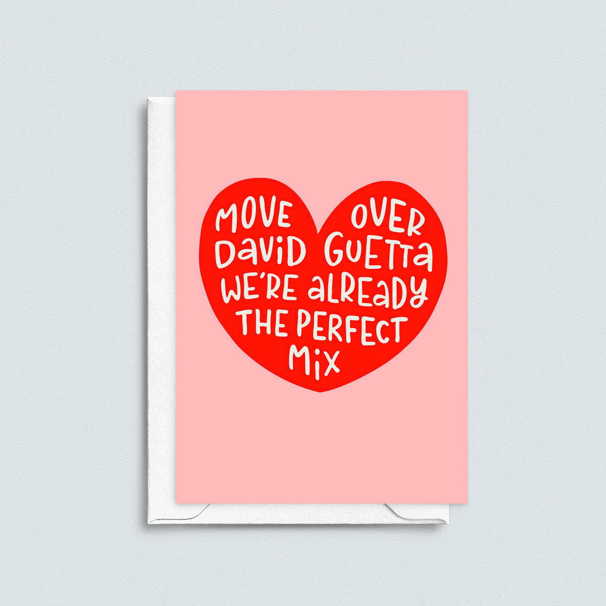 Card with red heart and text on a pink background