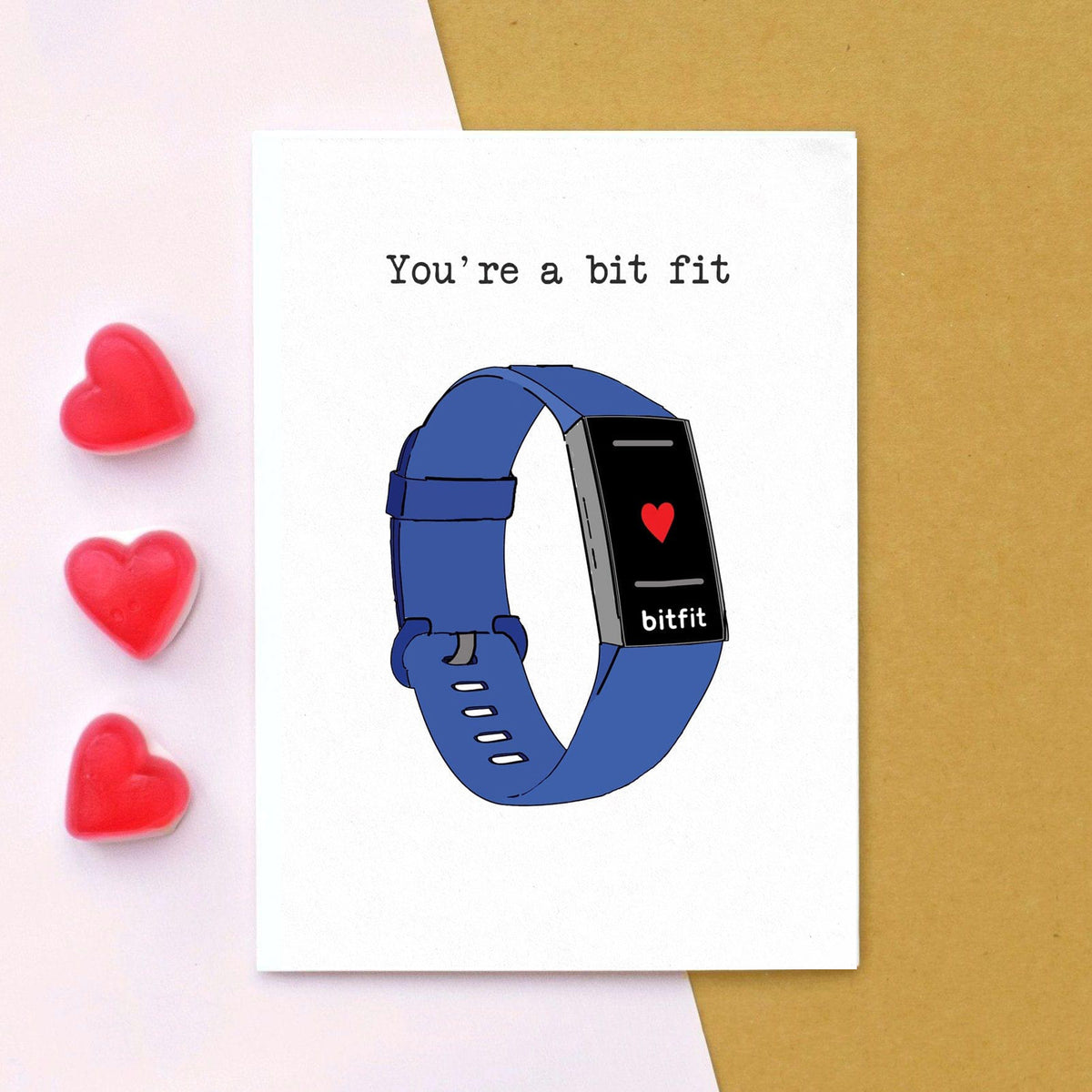 Card with a blue Fitbit illustration and text 'You're a bit fit' on a white background.