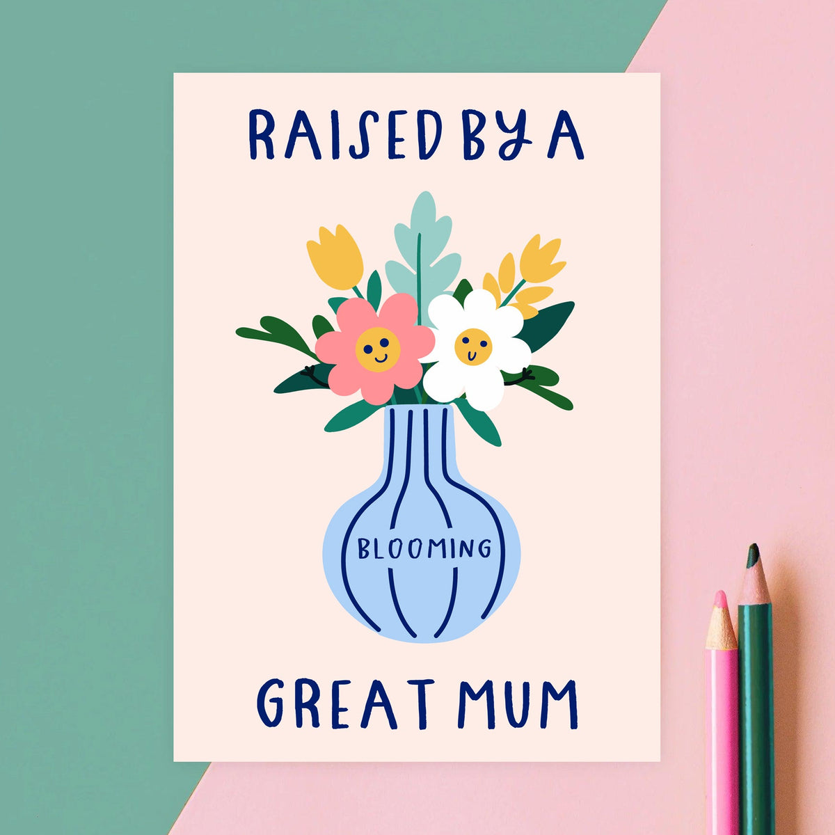 Card with flowers in a vase and text 'Raised by a blooming great mum' on a colorful background.