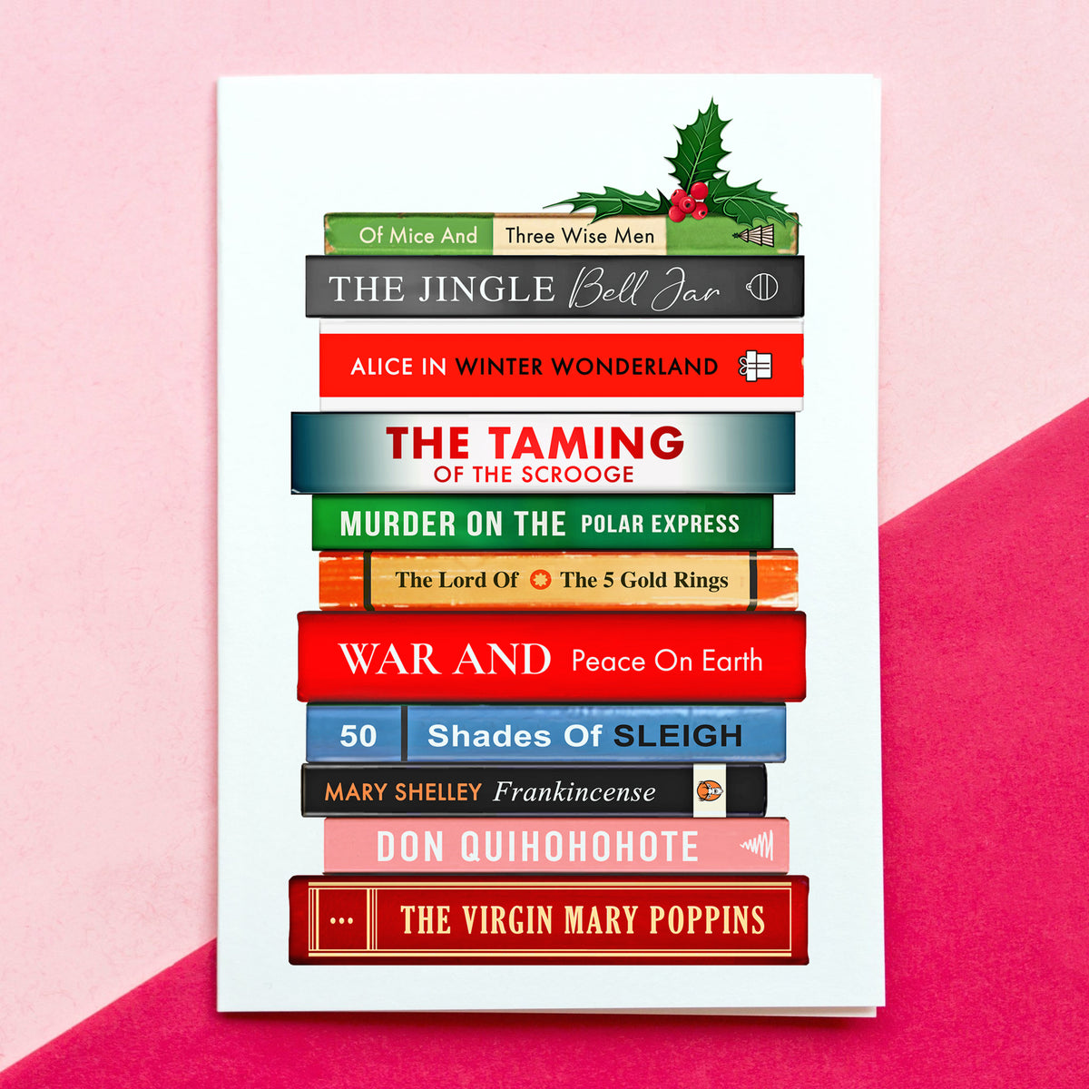Christmas card featuring a stack of books with festive puns on book titles on a pink background