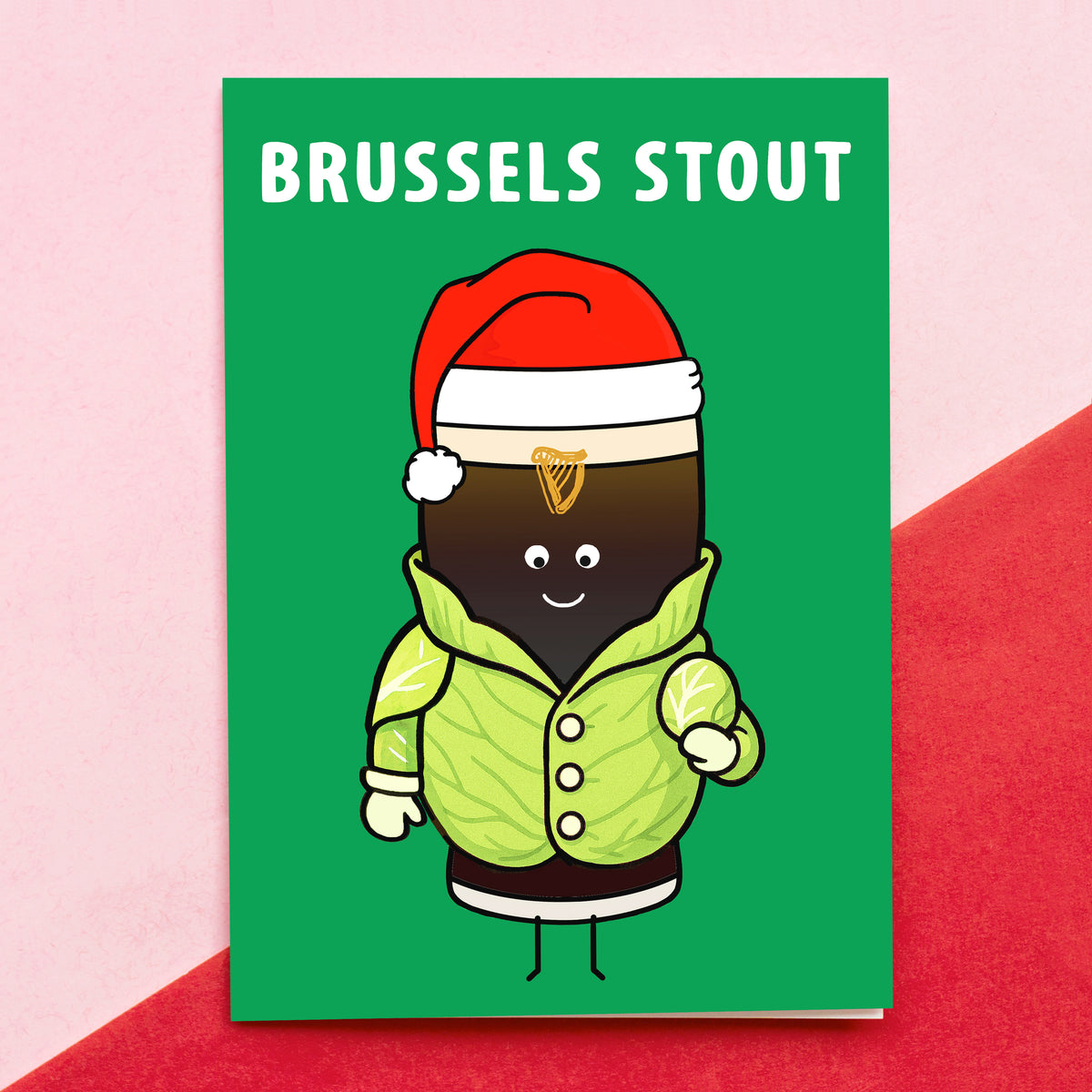 Brussels Stout character with a Santa hat on a green background