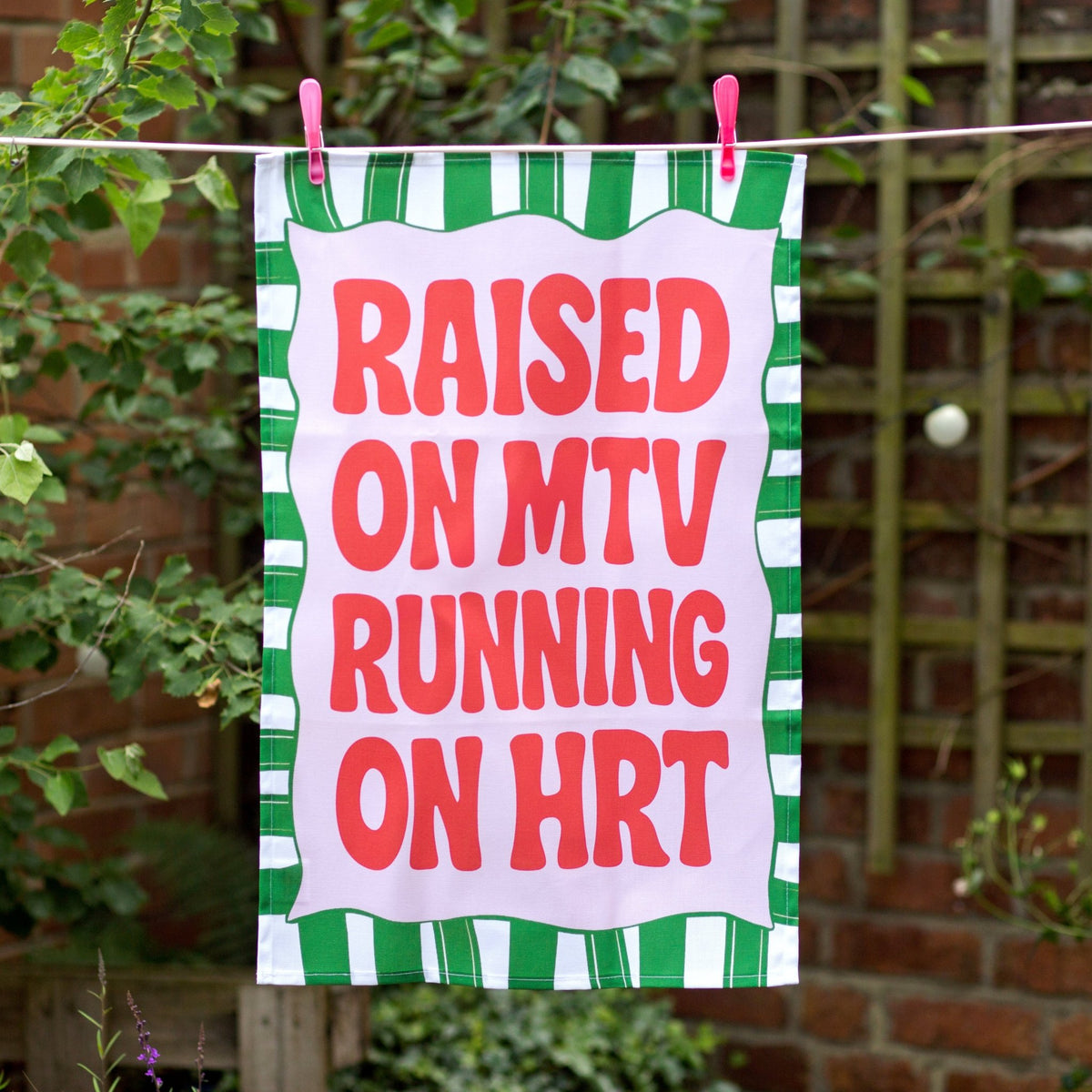 raised on mtv running on hrt tea towel hanging on a washing line