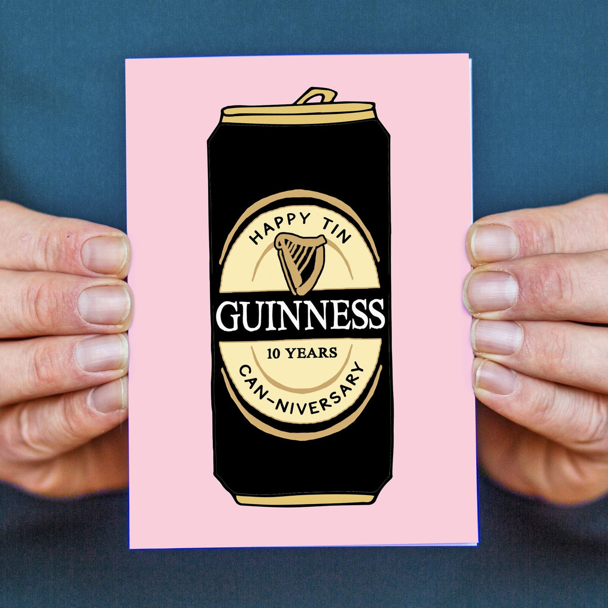 a card featuring an illustration of a can of guinness with a pun and details of a 10 year anniversary