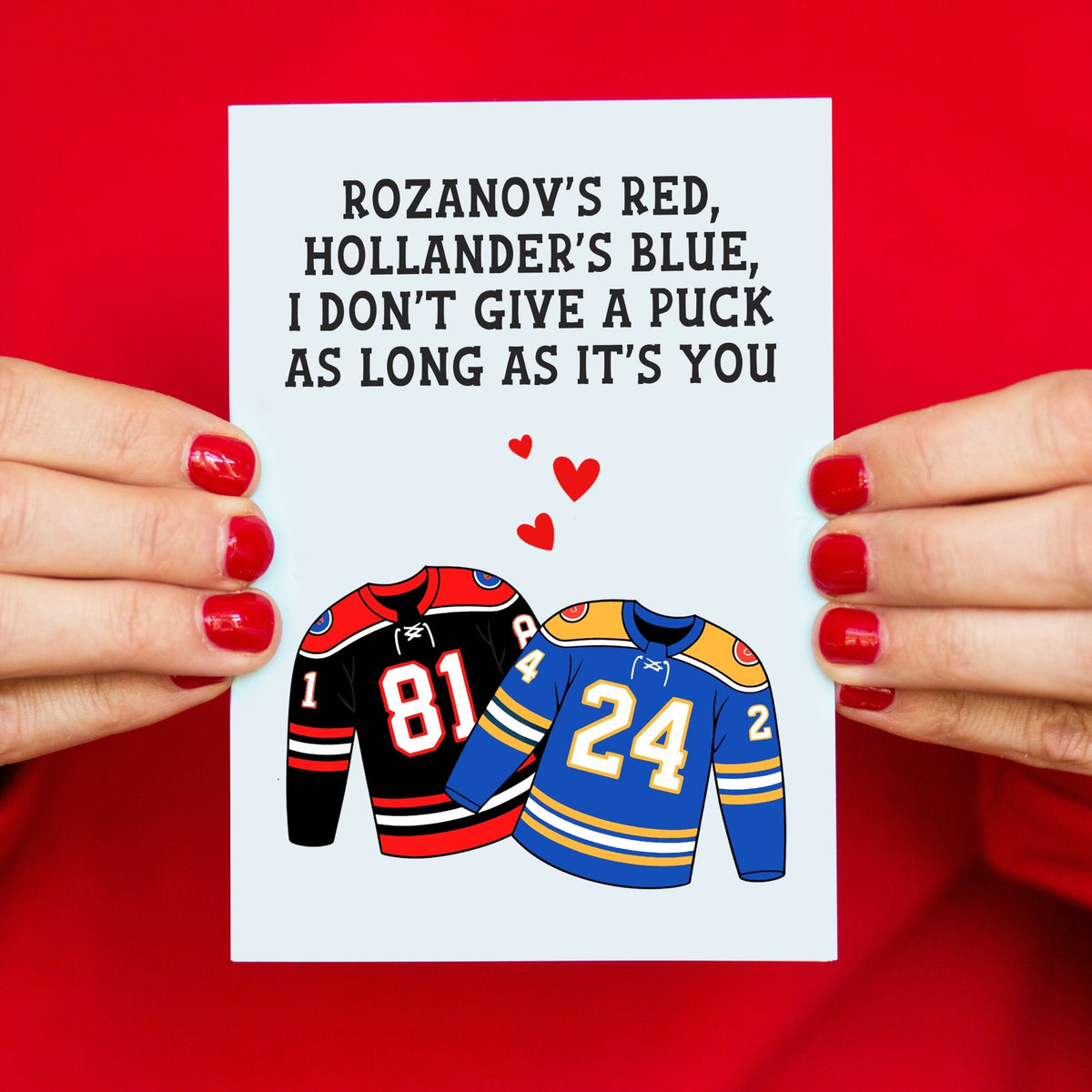 a funny card showing the two famous jerseys from the heated rivalry show and a funny poem