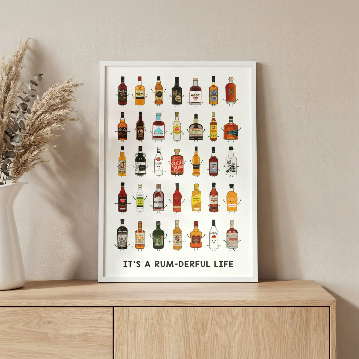 a montage of illustrated rum bottles in a white frame on wooden cabinet