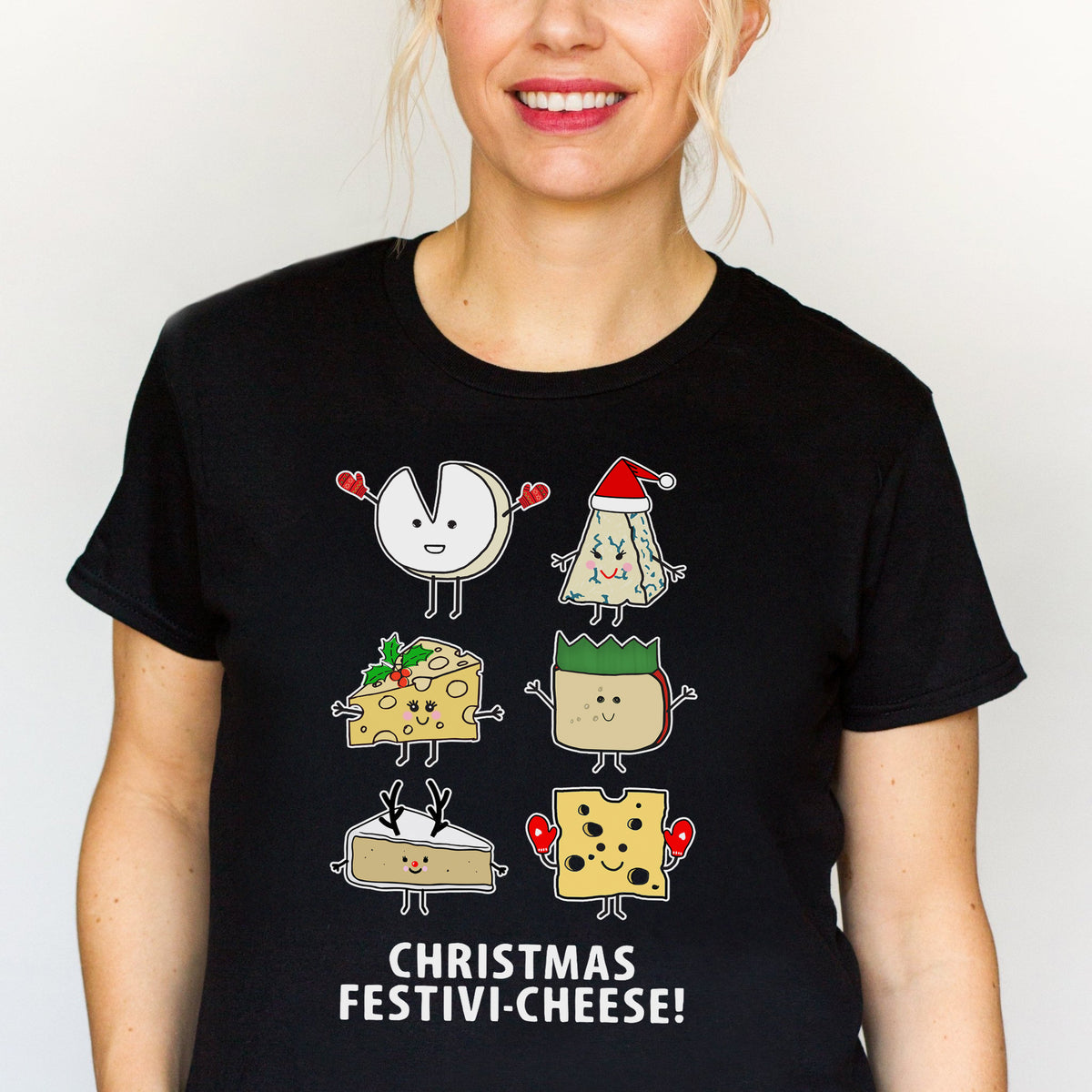Person wearing a black t-shirt with cartoon cheese characters and 'Christmas Festivi-cheese!' text.
