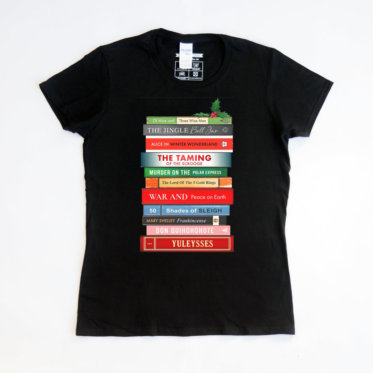 Black t-shirt with colorful book stack design on a white background