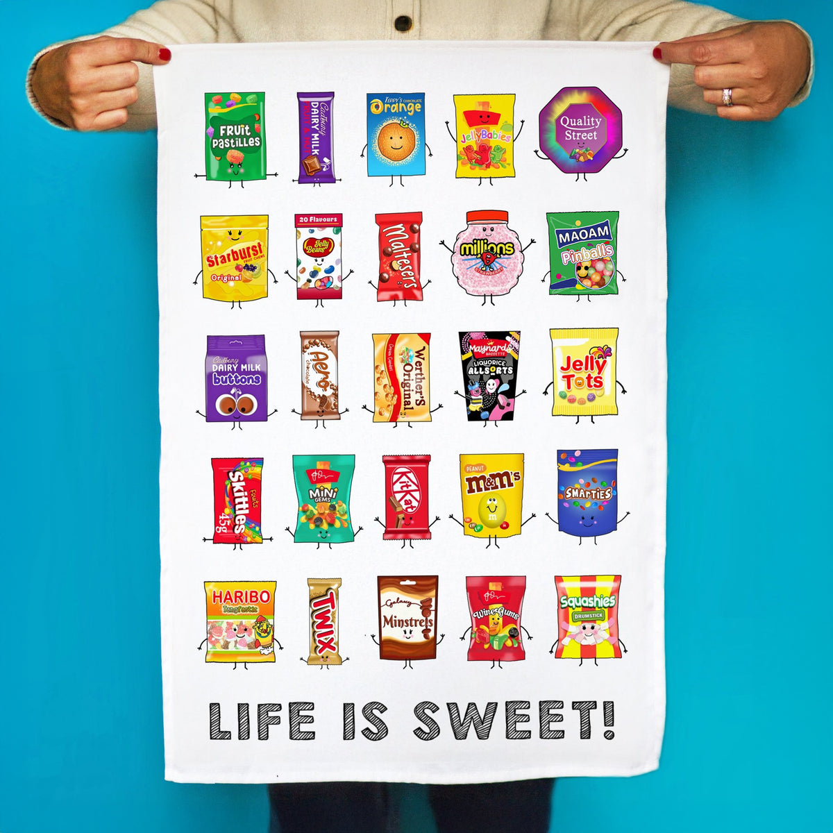 tea towel featuring a series of cartoons of different candy and sweets held aloft against a blue background. 