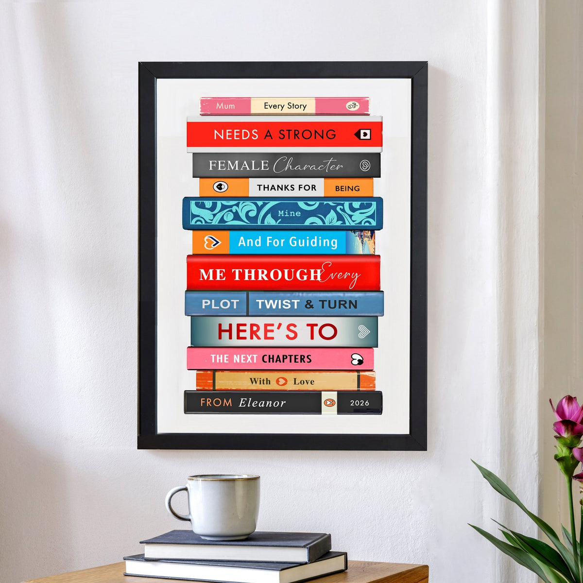 a print featuring a stack of books on a wall