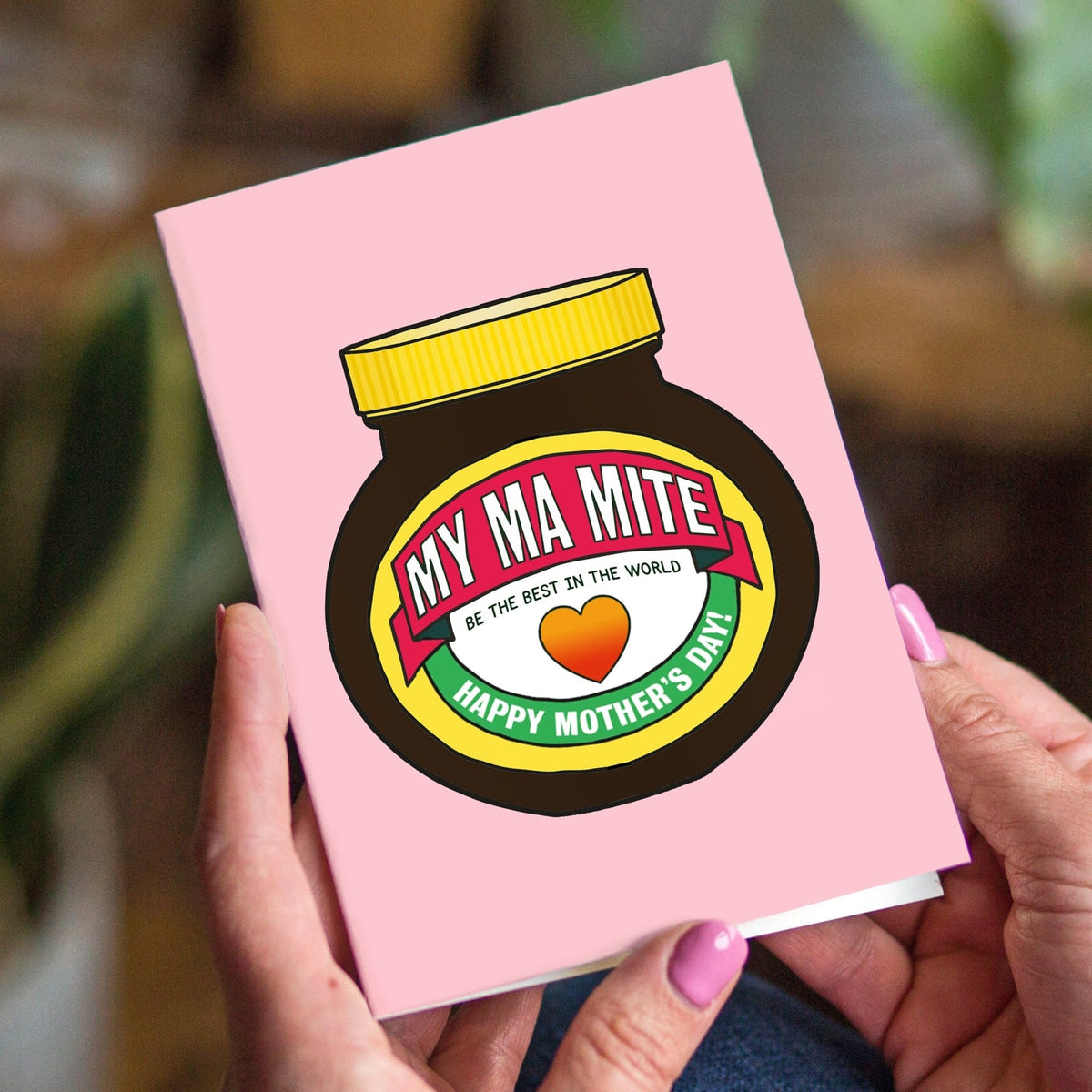 marmite mother's ay card held in female hands