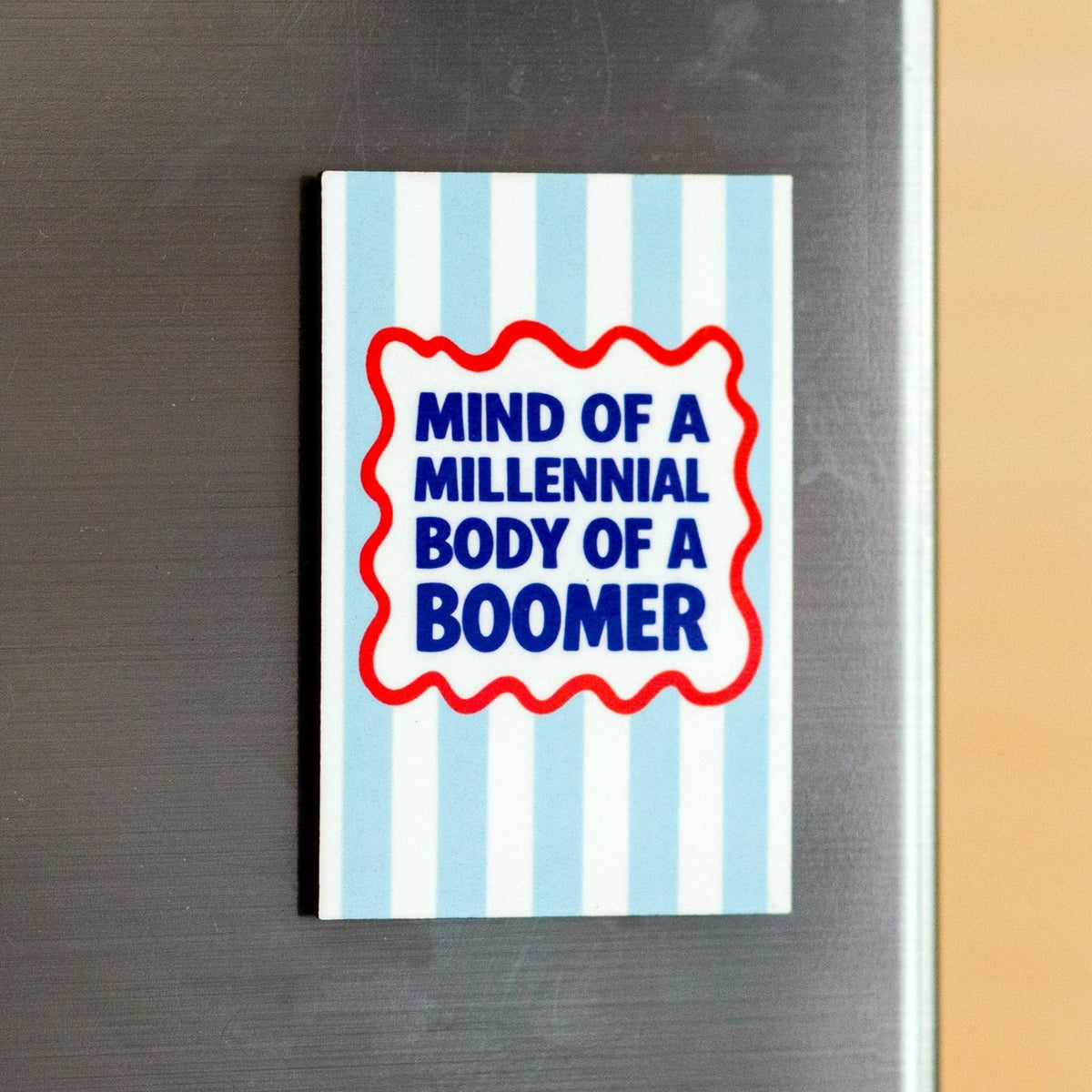 funny fridge magnet with slogan about ageing on a fridge door
