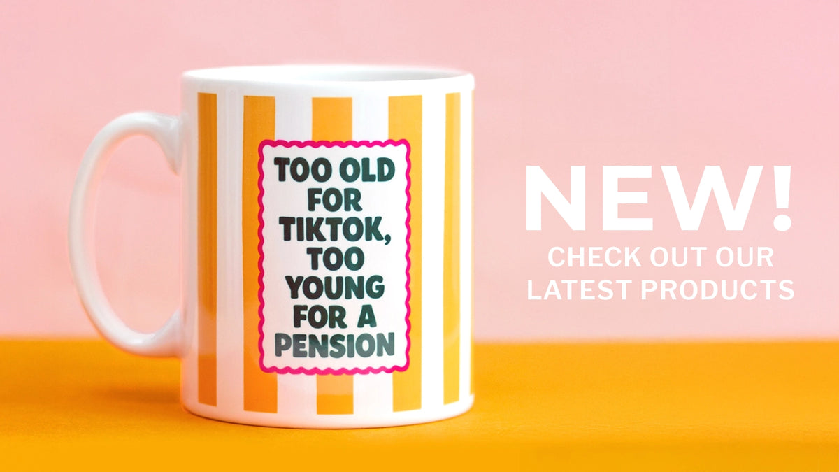 A white ceramic mug with orange and white vertical stripes, featuring a central pink-bordered label with the text 'TOO OLD FOR TIKTOK, TOO YOUNG FOR A PENSION'. The mug is set against a split pink and orange background with promotional text on the right reading 'NEW! CHECK OUT OUR LATEST PRODUCTS'.