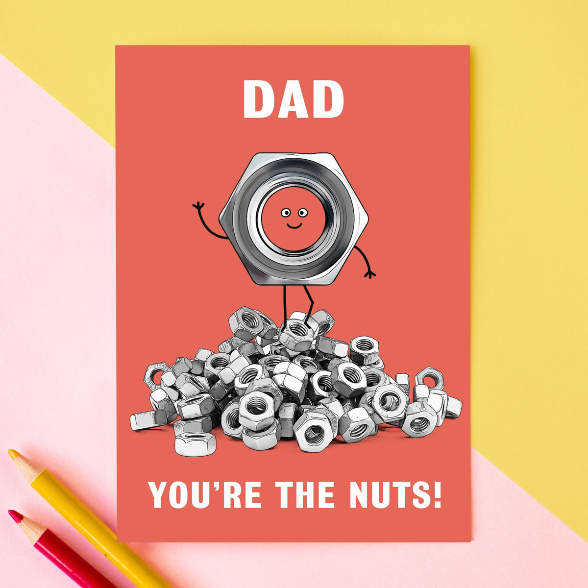 A card for Dad by Of Life & Lemons that says 'Dad You're The Nuts' and features an illustration of a pile of nuts and bolts