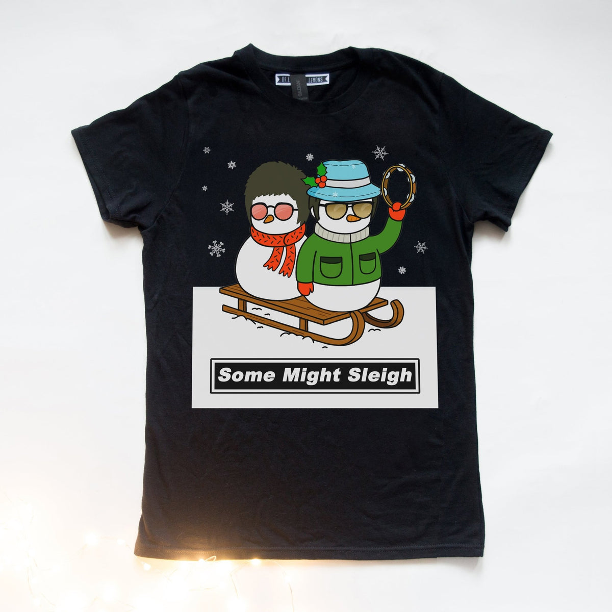Black Christmas t-shirt with cartoon Noel and Liam Gallagher illustration and 'Some Might Sleigh' text on a white background