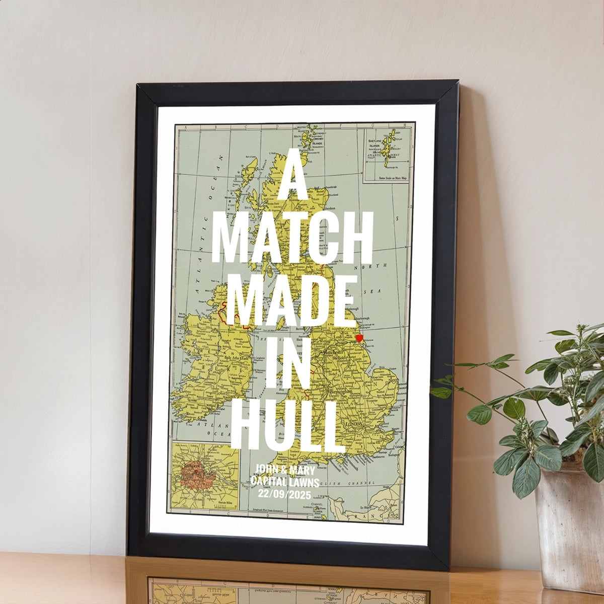Framed map print with 'A Match Made in Hull' text on a table.