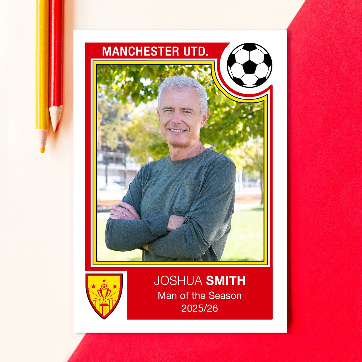 Manchester United-themed card with a person's photo and text on a red background