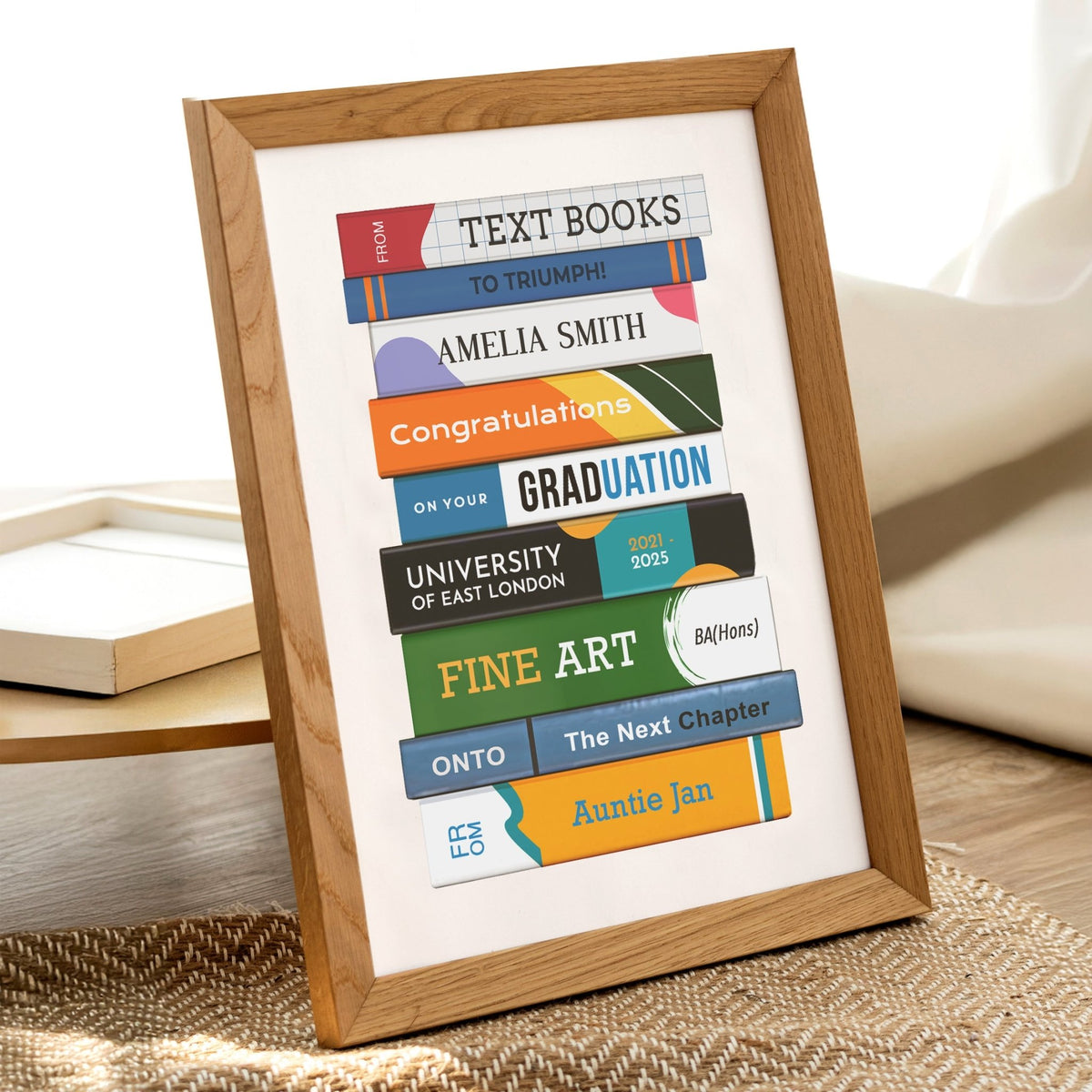 Framed graduation-themed poster with colorful text on a white background