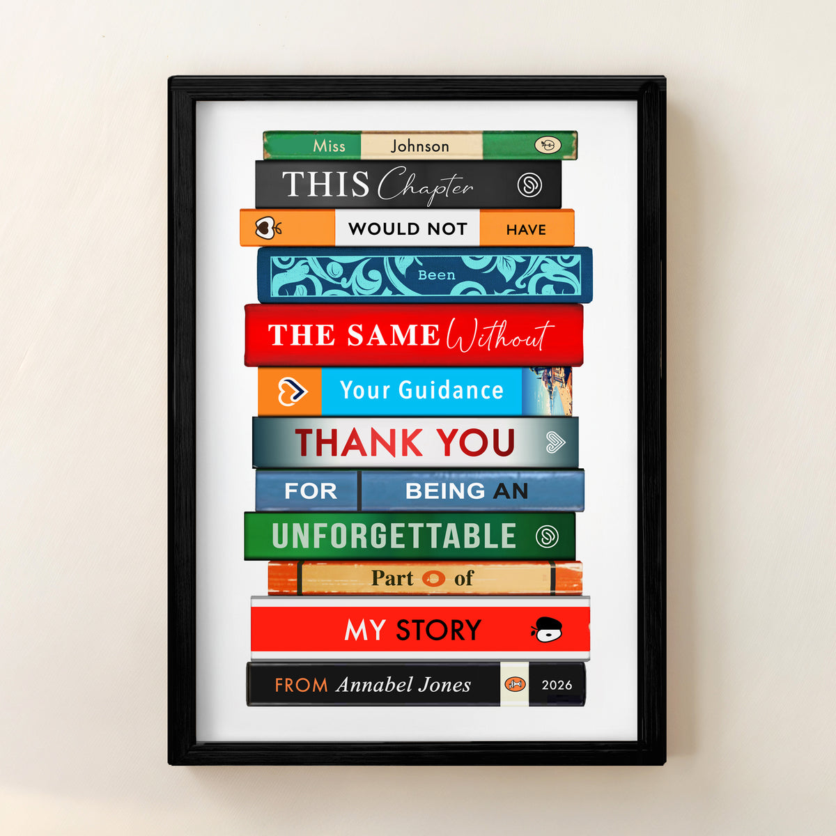 Framed artwork with colorful bookstack design that spell out a thank you teacher message on a white background