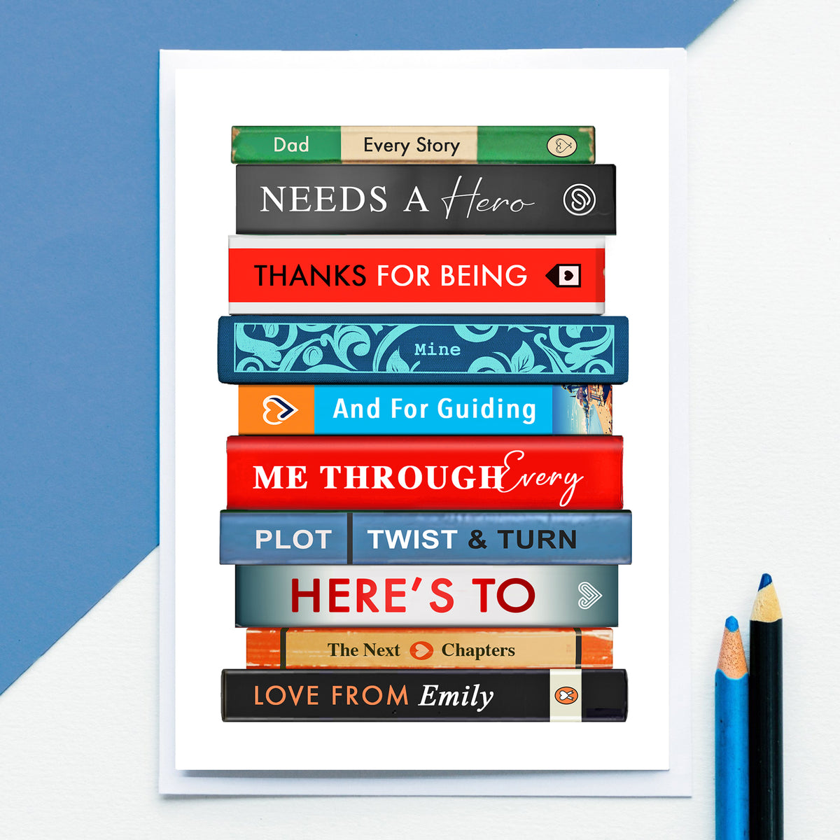 Stack of books with personalised message for Dad on a white background