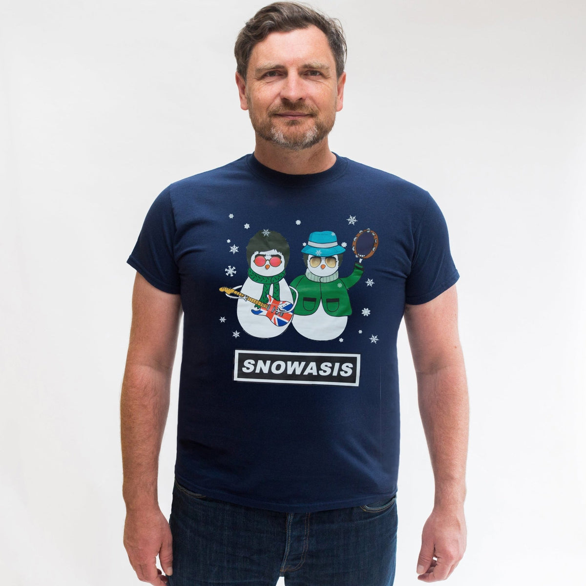 Man wearing a navy Christmas T-shirt featuring Liam and Noel Gallagher as snowmen and the phrase Snowasis on a white background