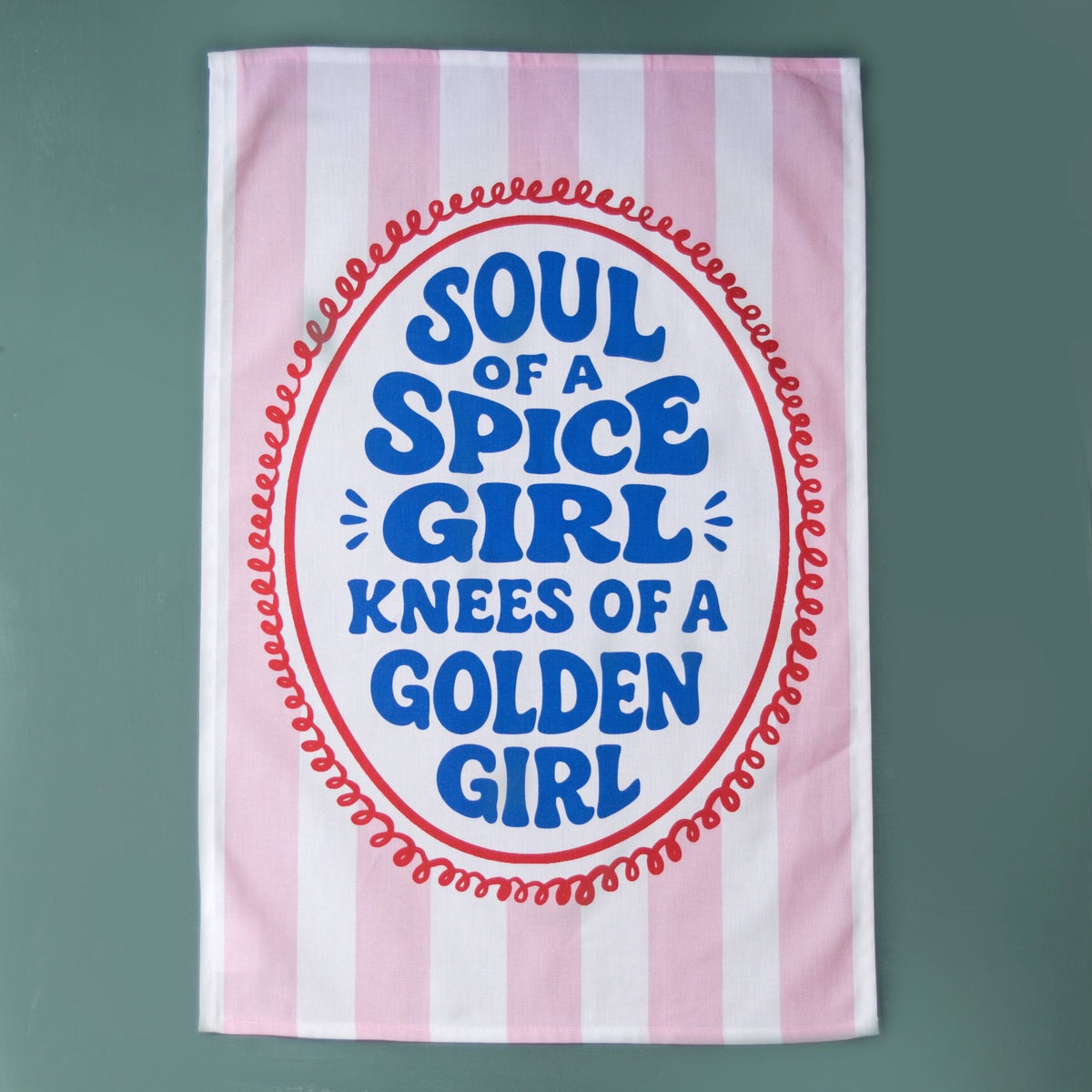 pink and white striped tea towel with a funny slogan on a dark green background