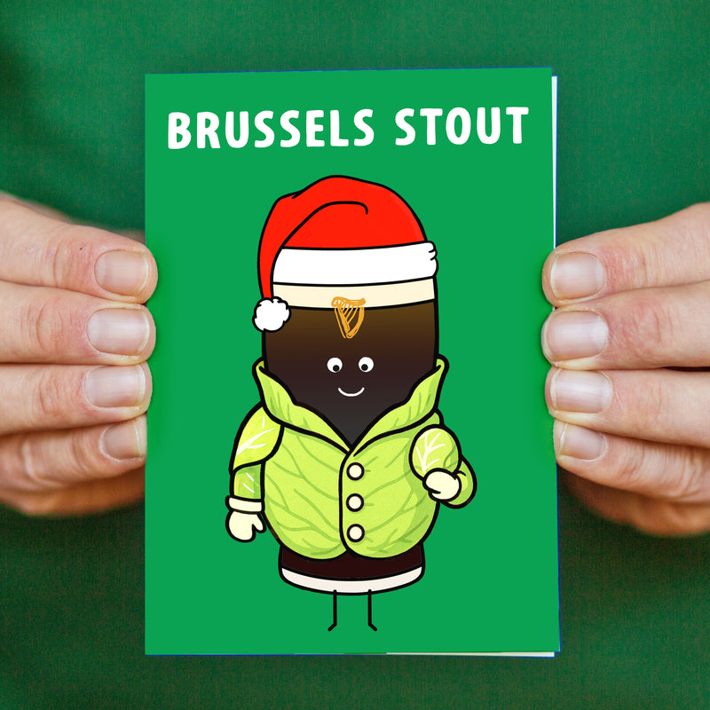 a funny christmas card featuring an illustration of a pint of guinness dressed as a brussel sprout and a funny pun