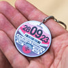 anniversary gift of a keychain that is personalised with the anniversary details