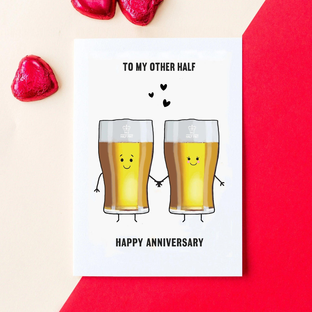 beer themed anniversary card with illustrations of two half pints and the words 'Happy anniversary to my other half'
